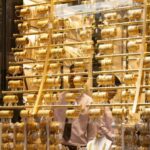 A close-up view of the window of a luxury jewelry store in Dubai