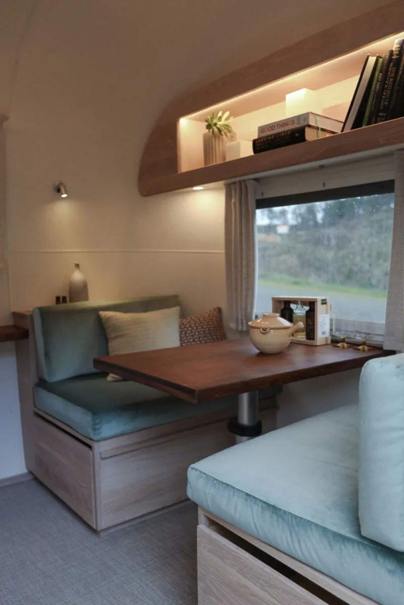 Cozy and minimal dining space inside the renovated luxury caravan
