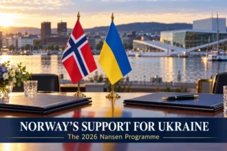 Conceptual Norwegian and Ukrainian desk flags at a diplomatic meeting